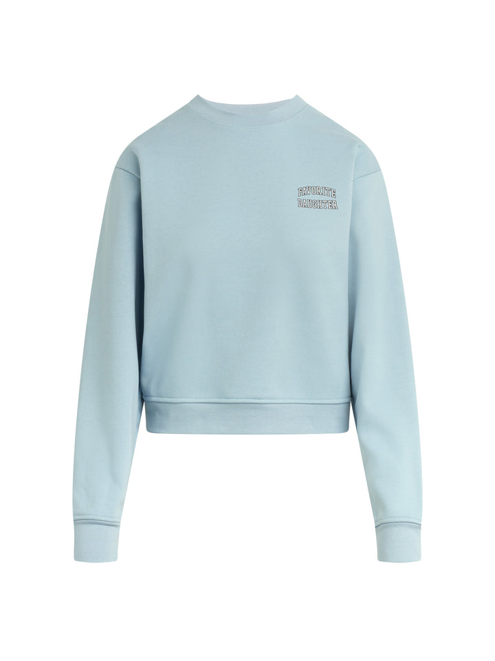 The Zertz COLLEGIATE CHEST CLASSIC SWEATSHIRT is a light blue, long-sleeve cropped top with small white text on the upper left shoulder. Its simple, minimal design is comfortable and ideal for everyday wear. Shown here from the back.