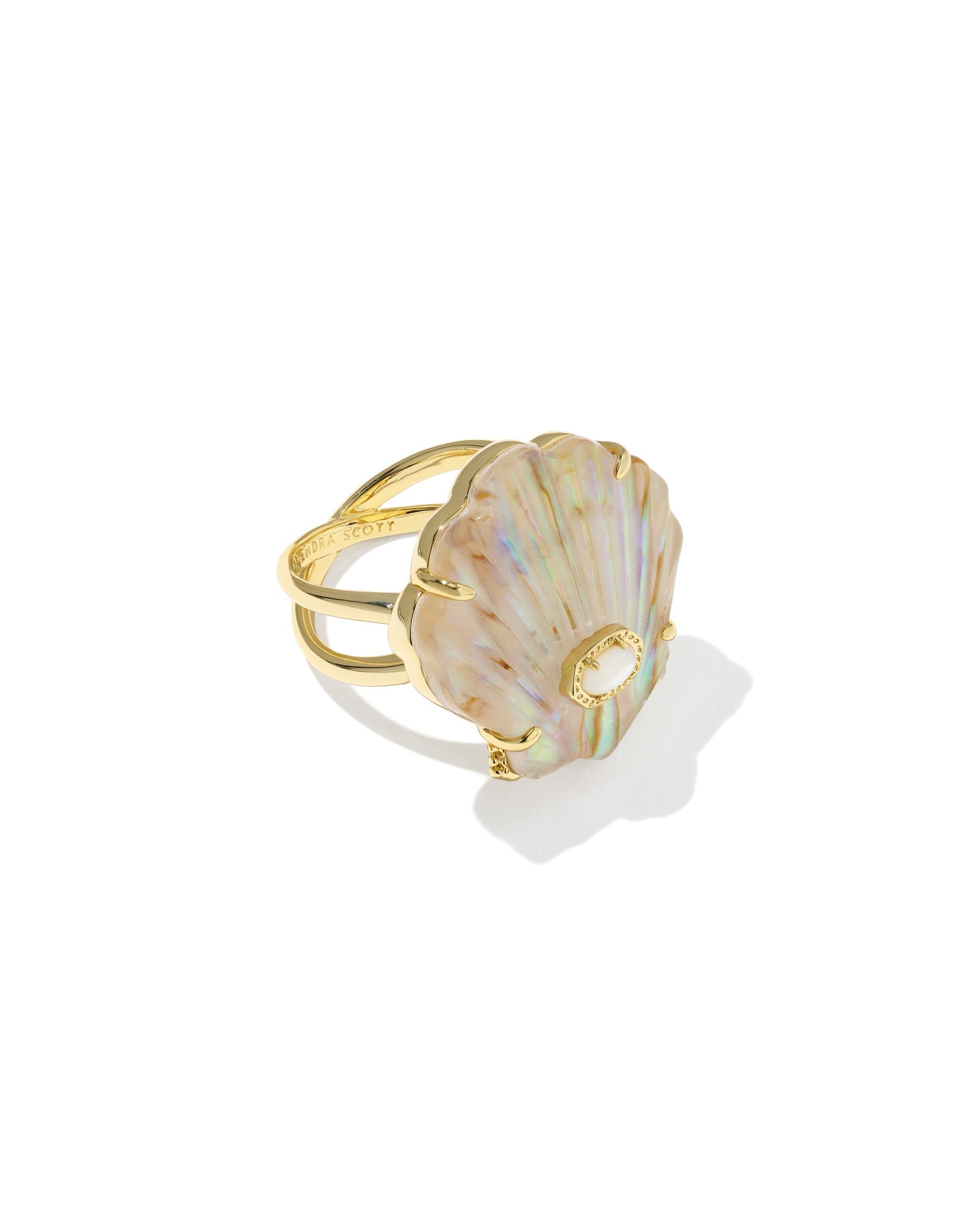 The Zertz LUCIA SHELL CCKTL RING features a striking, iridescent gold shell-shaped centerpiece with pastel hues on a double band—ideal for those who love unique coastal jewelry.