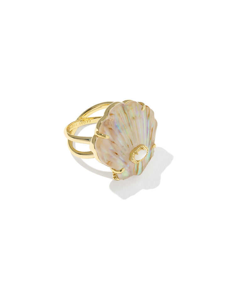 The Zertz LUCIA SHELL CCKTL RING features a striking, iridescent gold shell-shaped centerpiece with pastel hues on a double band—ideal for those who love unique coastal jewelry.