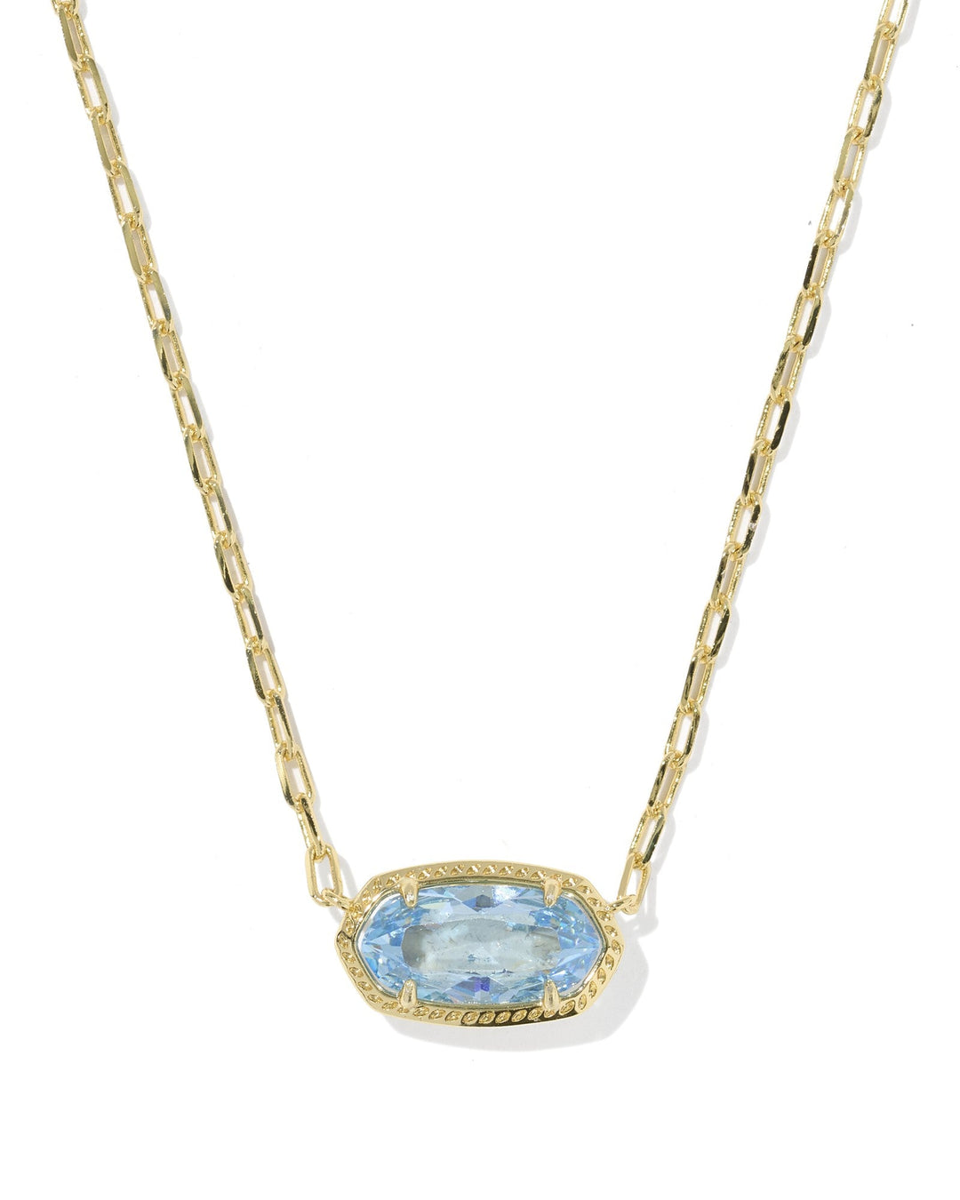 The Zertz ELISA LUXE PENDANT NECKLACE features a gold chain and a light blue CZ elongated oval pendant set in a gold bezel.