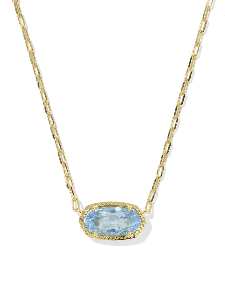 The Zertz ELISA LUXE PENDANT NECKLACE features a gold chain and a light blue CZ elongated oval pendant set in a gold bezel.