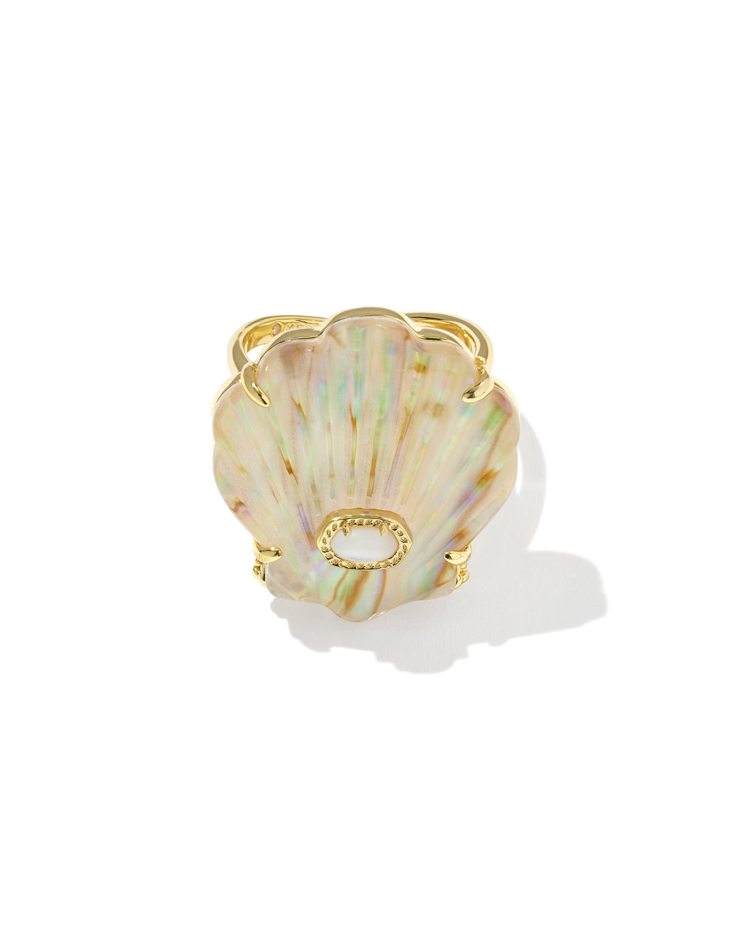 The Zertz LUCIA SHELL CCKTL RING features a large, iridescent seashell-shaped design in pastel hues with a small gold accent at the center, making it a striking statement piece. Shown on a white background.