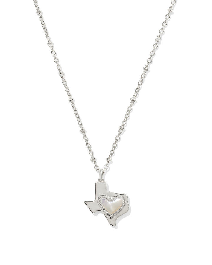 The Zertz ARI HEART TEXAS SHORT PNDT NCK is a silver necklace with a heart-shaped Texas charm at the center, perfect for showing your love for Texas jewelry.