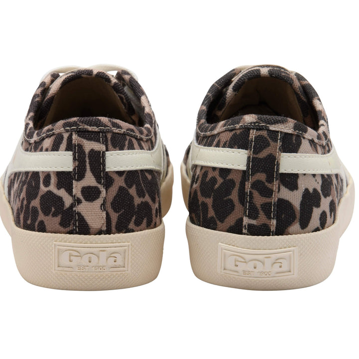A pair of Zertz COASTER LEOPARD TRAINER women’s sneakers with a beige and black leopard print, shown from the back. These retro-style canvas shoes feature cream rubber soles with embossed Zertz branding on the heel.