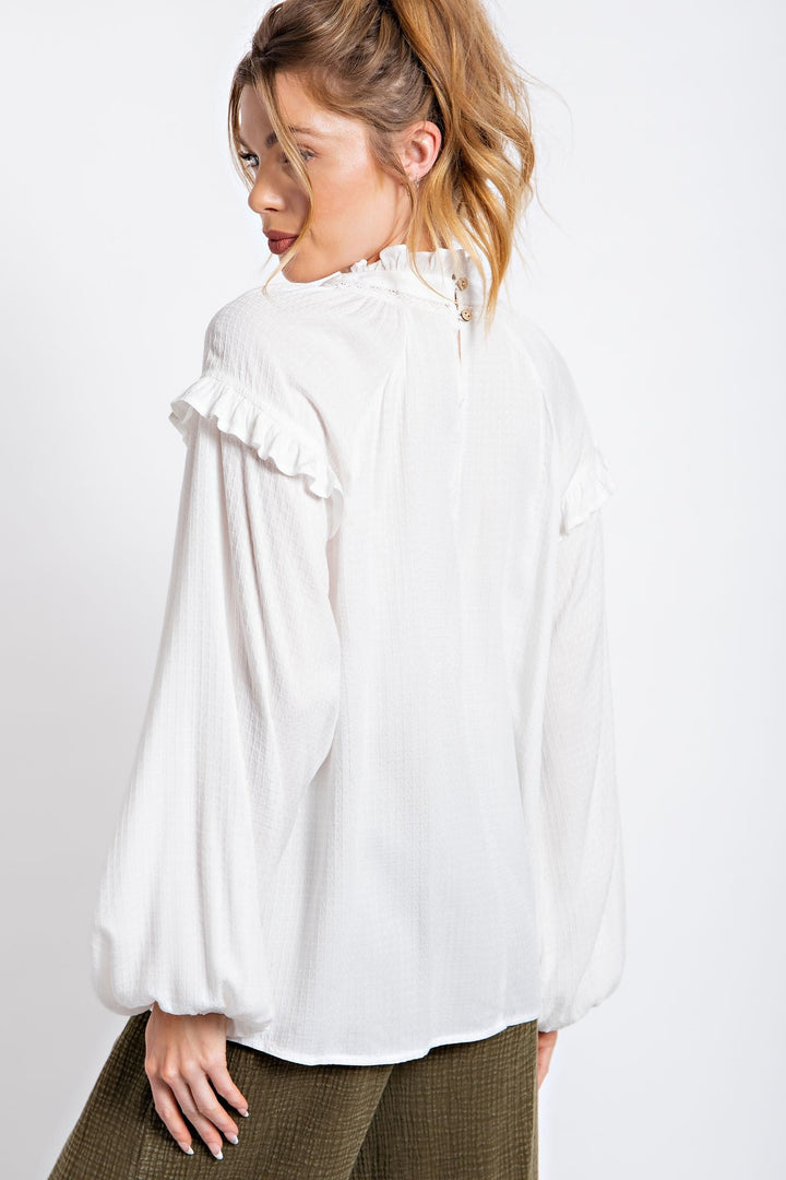 TEXTURED CREPE LOOSE FIT BLOUSE in IVORY